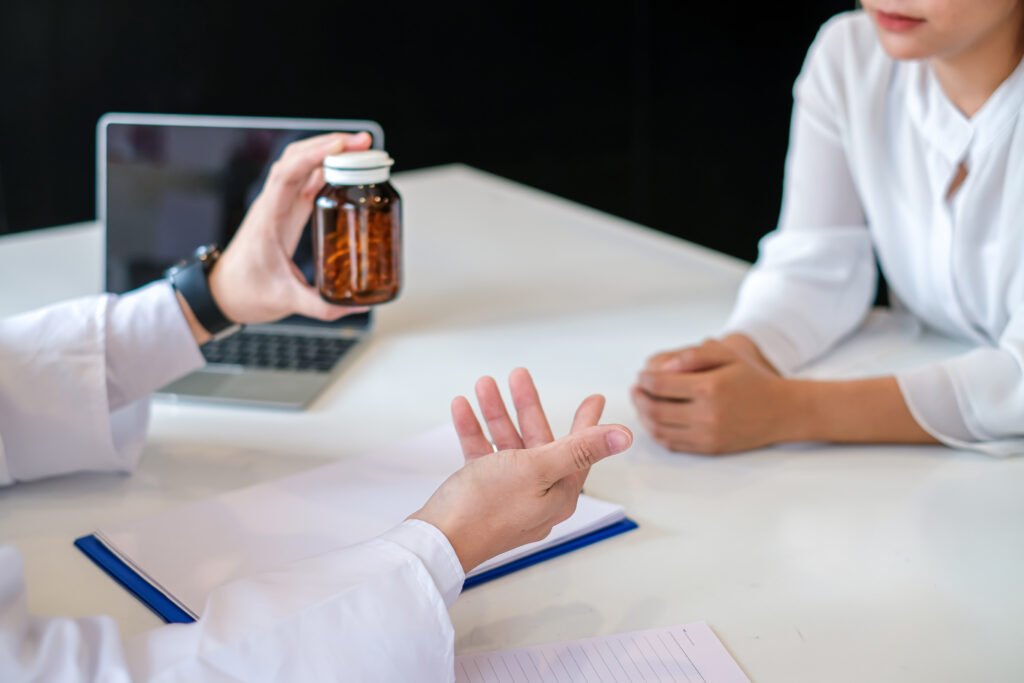 Doctor is explaining about the medication to the patient.